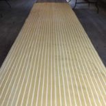 A pair of 20th century gold coloured striped velvet curtains