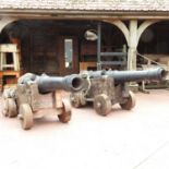 A pair of large replica Tudor ships cannons
