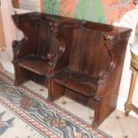 A 19th century carved oak church pew