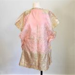 An Indian pink silk tunic