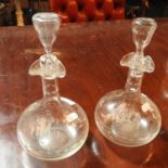 A pair of early 20th century glass hand blown decanters and stoppers