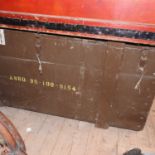 An early 20th century green painted wooden military trunk