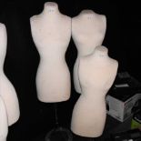 Three dress maker's dummies