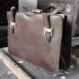 A vintage Gucci brown leather handbag
