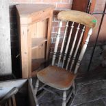 A 19th century pine spindle back chair