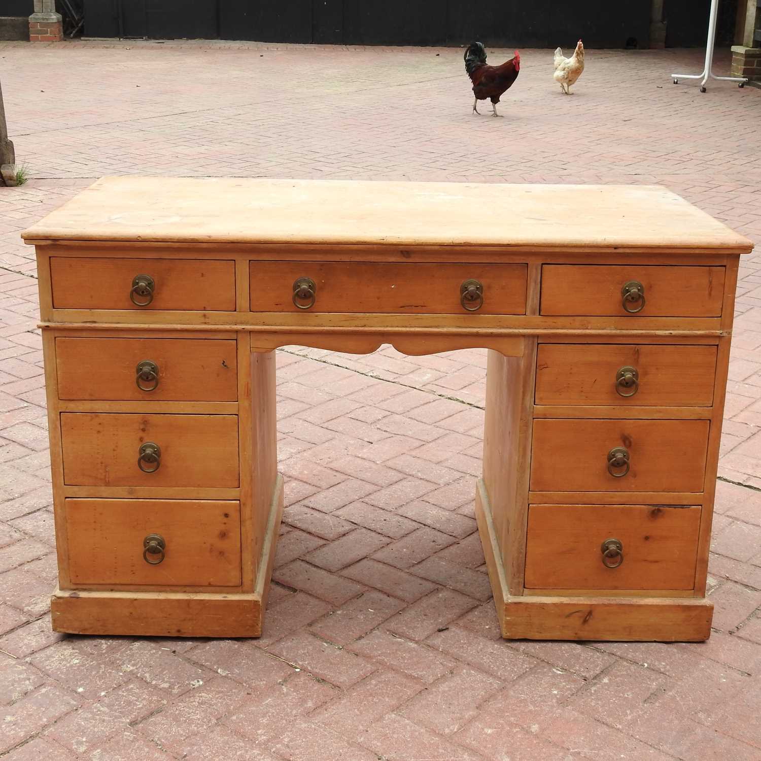 A 19th century pine pedestal desk