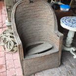 A 19th century woven commode chair