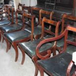 A set of twelve Regency style mahogany dining chairs