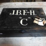 An early 20th century black painted metal deed box