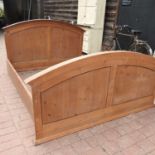 A pine double bedstead