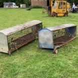 A galvanised sheep feeder