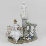 A Lladro porcelain figure group