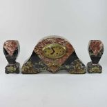 A French Art Deco coloured marble clock garniture