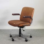 A mid 20th century brown upholstered bentwood swivel desk chair