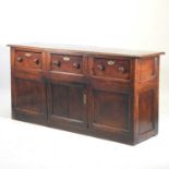 An 18th century and later oak dresser base