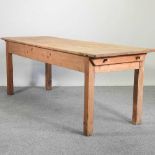 An antique pine dining table