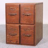 An early 20th century oak filing cabinet