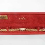 An 18 carat gold and diamond set Omega ladies wristwatch