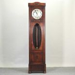 A 1930's oak cased longcase clock