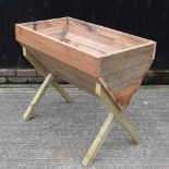 A wooden garden planter