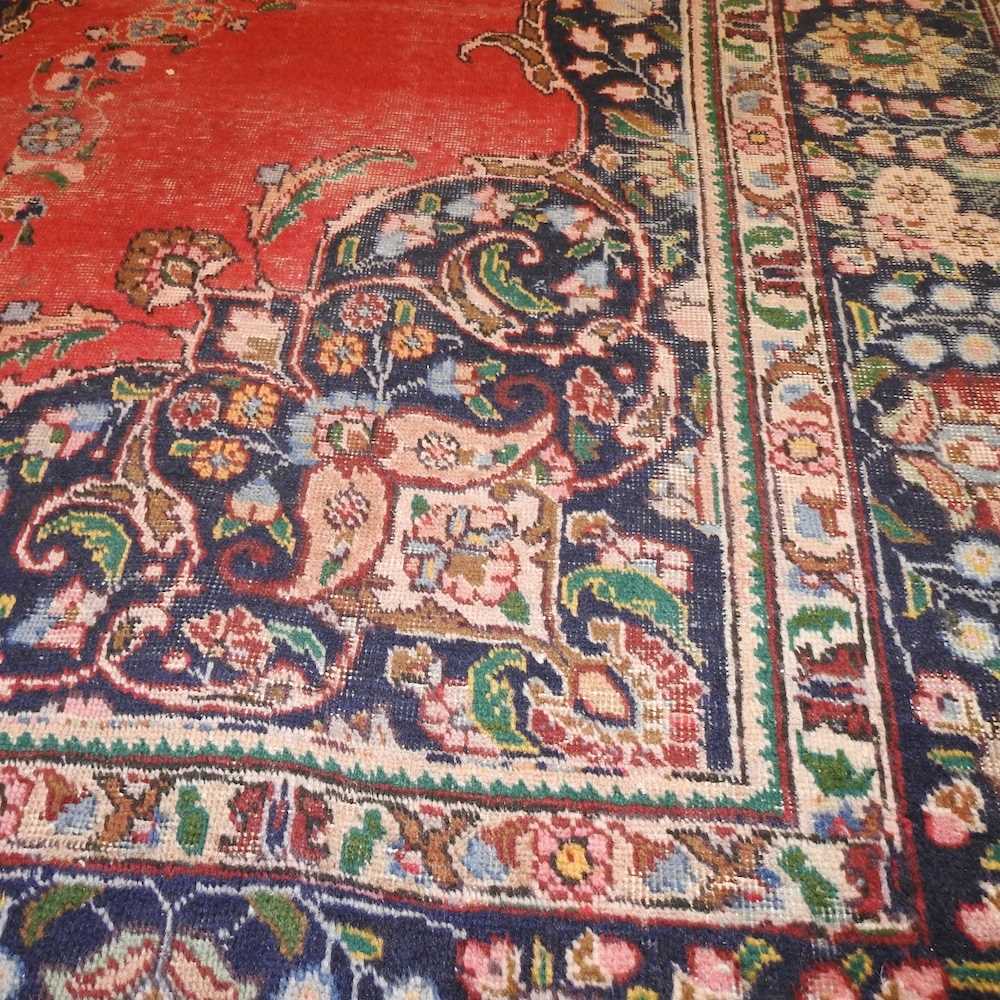 A Persian woollen carpet - Image 4 of 5