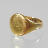A child's 18 carat gold signet ring