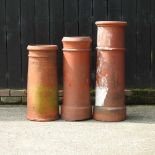 Three large chimney pots