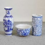A blue and white glazed pottery stick stand