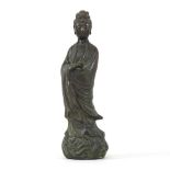 A Chinese bronze figure of Guanyin