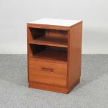 A mid 20th century teak bedside cabinet