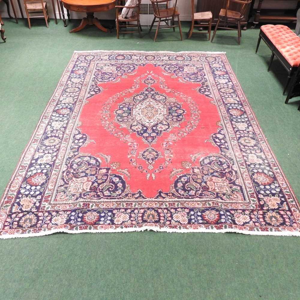 A Persian woollen carpet - Image 3 of 5