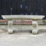 A reconstituted stone garden bench