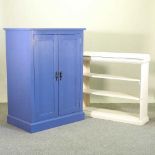A blue painted pine cupboard