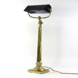 A brass desk lamp