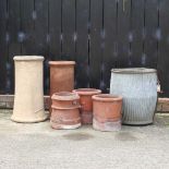 A collection of five various chimney pots