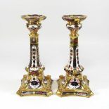 A pair of Royal Crown Derby 'Old Imari' pattern table candlesticks