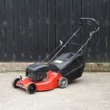 A Champion petrol lawnmower