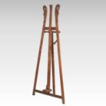 An early 20th century fruitwood easel