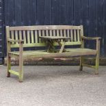 A wooden slatted garden bench