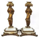 A pair of 19th century French gilt mounted table candlesticks