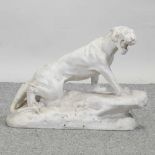 A carved white marble model of a lioness