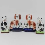 A rare pair of 19th century Staffordshire pottery dogs