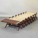 An early 20th century folding campaign bed
