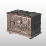 An 18th century carved oak coal box
