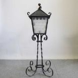 A wrought iron exterior lantern