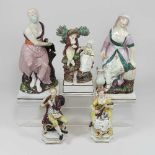 A pair of early 19th century Staffordshire pottery figures