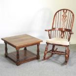 An Ercol style elm rocking chair