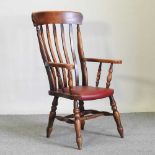 An early 20th century splat back armchair