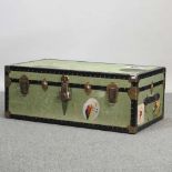 A mid 20th century green canvas travel trunk