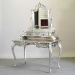 A silver painted dressing table